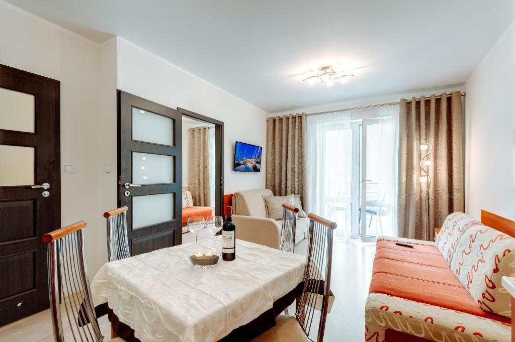 Апартаменты Apartament Przy Latarni Колобжег